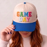 Game Day colorful puff embroidered heat press hat patch applied to cream and blue baseball cap