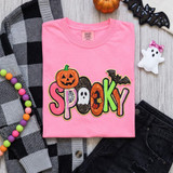 Spooky Halloween Sequin Patch, pink sweatshirt with Halloween themed sequin patches including a pumpkin, ghost, spider web, bat, and leaves.