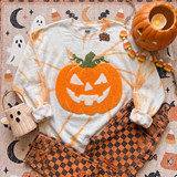 Fluffy orange jack-o’-lantern pumpkin heat press patch with white face and green stem for textured Halloween shirts and sweatshirts