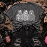 Three patterned ghost trio DTF transfer with floral, leopard, and polka dot print designs on a dark heather shirt