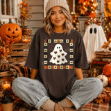 Country quilt-style Halloween DTF transfer with two teddy bears in pumpkin overalls, candy corn border, and folk-art stars on a t-shirt