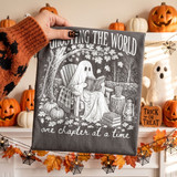Ghosting the World One Chapter at a Time DTF transfer with ghost reading a book in an autumn scene, cozy Halloween fall design