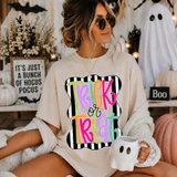 Trick or Treat DTF transfer with colorful bubble lettering on a black and white striped scalloped frame