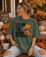 Ate and Left No Crumbs Literally DTF transfer with pumpkin pie slices and star accents on a green shirt