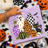 Patterned Ghost Trio Halloween DTF Transfer, hand-drawn spooky season design featuring three ghosts with leopard, checker, and star patterns, surrounded by pumpkins, a black cat, spider webs, and Halloween-themed decorations.