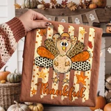 Thankful Turkey DTF Transfer, whimsical fall Thanksgiving design featuring a cute turkey with colorful patterned feathers and the word 'Thankful' written below.
