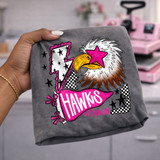 Hawks mascot DTF transfer with hawk head wearing a pink star over one eye in retro pink out style