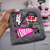 Raiders pirate mascot DTF transfer with pink lightning bolt, checkered pattern, and pennant flag in a pink-out school spirit style