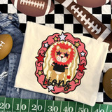 Lions mascot DTF transfer featuring a lion wearing star sunglasses and a jersey inside a pink star-studded oval frame, designed for school spirit and game day shirts