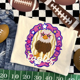 Eagles mascot DTF transfer featuring a bald eagle wearing star sunglasses inside a pink and gold star-studded oval frame with glitter accents