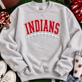 Red and white Indians football chenille patch with varsity lettering, puff embroidered football laces and thin sequin outline for game day apparel