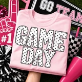 Game Day DTF transfer with polka dot block lettering on a pink shirt