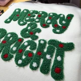 Close up fluffy Merry and Bright apparel patch