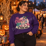 My Other Ride Is Your Dad retro pin-up witch DTF transfer with pink star-print jacket, striped stockings, and broomstick in front of a distressed pink moon Shown on a Purple crewneck sweatshirt.