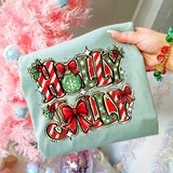 Holly Jolly Christmas DTF transfer with candy cane striped lettering, polka dot accents, holly berries, and red bows