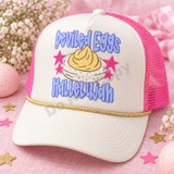 Deviled Eggs Hallelujah DTF transfer with a swirled deviled egg illustration, gold stars, and pink star accents Shown on a Ivory front panel, gold rope, hot pink mesh back trucker hat.