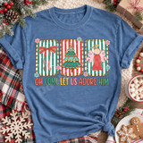 Oh Come Let Us Adore Him Christmas DTF transfer with scalloped striped panels featuring a bow, Christmas tree, and angel above colorful block lettering Shown on a Blue Jean t-shirt.