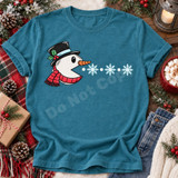 Cartoon snowman head DTF transfer wearing a black top hat with holly and red striped scarf, blowing snowflakes in a Pac-Man style design Shown on a Lagoon t-shirt.
