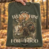 Let Us Thank Him For Our Food hunting DTF transfer with whitetail buck, turkey, mallard duck, chocolate lab, bass, and johnboat scene with Genesis 9:3 verse Shown on a Moss t-shirt.