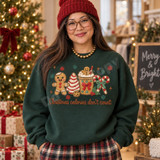 Christmas calories don't count DTF transfer with embroidered-style gingerbread man, striped candy tree, cocoa mug, and candy cane holiday design Shown on a Forest crewneck sweatshirt.