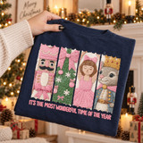 It's The Most Wonderful Time Of The Year DTF transfer with embroidery-style pink nutcracker, Christmas tree, ballerina, and crowned squirrel panels Shown on a True Navy t-shirt.