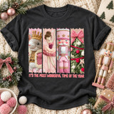 It's The Most Wonderful Time Of The Year DTF transfer with embroidered-yarn style Mouse King, ballerina, nutcracker soldier, and Christmas tree panels in pink and sage tones Shown on a Pepper t-shirt.
