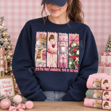 It's The Most Wonderful Time Of The Year DTF transfer with embroidered-yarn style Mouse King, ballerina, nutcracker soldier, and Christmas tree panels in pink and sage tones Shown on a Navy crewneck sweatshirt.