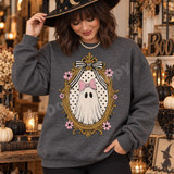 Vintage Frame Ghost DTF Transfer | Pastel Polka-Dot Halloween Design, pastel ghost with a pink bow inside an ornate vintage gold frame with polka dots and pink flowers, printed on a gray sweatshirt