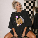 Turkin' 9-5 Western Turkey DTF Transfer | Funny Thanksgiving Design, colorful western turkey wearing a pink cowboy hat and boots with “Turkin’ 9-5” lettering printed on a black oversized T-shirt.