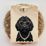 Black curly-coated dog DTF transfer wearing leopard print sunglasses and a rhinestone-inspired chain necklace in a hand-painted textured style