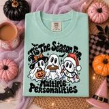 'Tis The Season For Multiple Personalities DTF transfer with three ghosts dressed for Halloween, Thanksgiving, and Christmas in retro bubble lettering