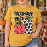 Fall Is My Happy Place DTF transfer with leopard print and polka dot pumpkins in hand-lettered script design Shown on a Mustard t-shirt.