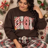 GIGI Christmas DTF Transfer | Festive Holiday Block Letter Design, festive red-and-green patterned block letters spelling GIGI displayed on a brown sweatshirt with holly, bows, and candy cane accents