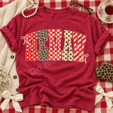 MEMAW varsity word mark DTF transfer in mixed red polka dot, leopard, gingham, and stripe patterns with cream ribbon bow accents Shown on a Crunchberry t-shirt.