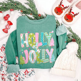 Holly Jolly Christmas DTF transfer in colorful pastel patterned lettering with mini Christmas trees and snowflakes on a green sweatshirt