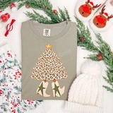 Leopard print Christmas tree DTF transfer with gold star topper and western cowgirl boots featuring star cutouts