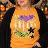 Three whimsical textured bats DTF transfer with purple polka dot, orange striped, and green star patterns surrounded by scattered stars and dots in a distressed Halloween screen-print style Shown on a Citrus t-shirt.