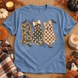 Boo Halloween DTF transfer with camo block letter B and two bow-topped ghost letters in polka-dot and checkerboard patterns, surrounded by bats and spiderwebs Shown on a Chambray t-shirt.