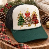 Whimsical Christmas trees DTF transfer featuring green buffalo plaid, red buffalo plaid, and leopard print trees with gold stars, bows, and scattered snowflakes Shown on a Ivory front panel, forest green bill, black mesh back trucker hat.