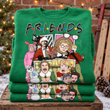 Retro Christmas movie mashup DTF transfer parodying the Friends logo with holiday film character illustrations in a checkerboard border Shown on a Irish Green crewneck sweatshirt.