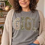 GIGI DTF transfer in oversized varsity letters with checkerboard, camo, leopard, and polka dot patterns and cream bow accents Shown on a Granite t-shirt.