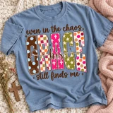 His Grace DTF transfer with bold mixed-pattern block letters spelling GRACE and hand-lettered script reading even in the chaos His grace still finds me Shown on a Chambray t-shirt.