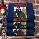 Hooded horror movie killer holding a knife and wrapped Christmas present on a snowy windowsill DTF transfer, with distressed red lettering reading Have Yourself a Scary Little Christmas Shown on a Sapphire crewneck sweatshirt.