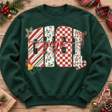 Gigi Christmas DTF transfer with block letters filled in candy cane stripe, holly berry, checkerboard, and leopard-mottled patterns, topped with red cursive gigi script, holly leaves, a jingle bell, and a candy cane Shown on a Forest crewneck sweatshirt.