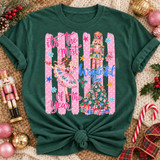 It's The Most Wonderful Time of the Year Christmas DTF transfer with pink ballerina, nutcracker soldier, decorated tree and pink polka-dot stripes Shown on a Emerald t-shirt.