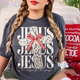 Jesus Is The Reason For The Season Christmas DTF transfer with distressed stacked lettering, a floral lace cross, and red gingham bow