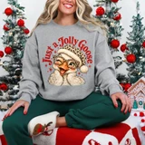 Just a Jolly Goose Christmas DTF transfer with a goose wearing leopard print glasses and a leopard trim Santa hat