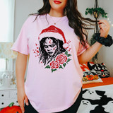 Possessed horror girl with scratched face wearing a Santa hat DTF transfer with red roses