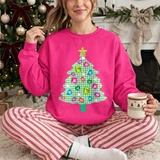Green gingham Christmas tree DTF transfer with colorful jeweled ornament artwork and gold glitter-style star on a pink sweatshirt