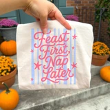 Feast First, Nap Later DTF transfer with pink retro script lettering, stars, and blue stripes for Thanksgiving shirts